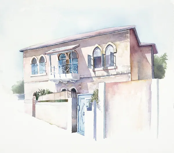 A house in Talbiyeh, its walls lit by warm sunlight.